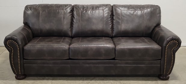 Ashley Furniture Banner Coffee Faux Leather Sofa