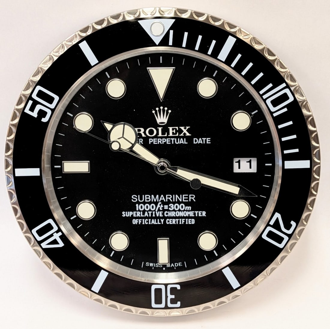 ROLEX Submariner Dealer Display Wall Clock: ROLEX Submariner Dealer Display Wall Clock, battery operated and measures 13.5in.? Clock is in condition *untested