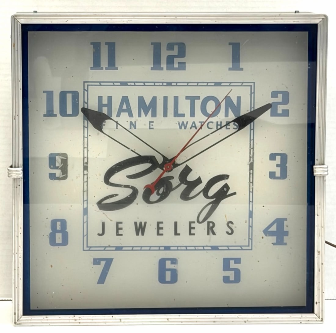 Hamilton Fine Watches Sorg Jewelers Electric Wall Clock: Hamilton Fine Watches Sorg Jewelers Electric Wall Clock.? The vintage Sorg Jewelers Wall clock is in nice used condition.? Clock measures 15.5 x 15.5 inches.? These advertising clocks are super cool a