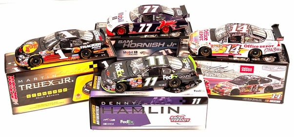 (4) 1:24 Autographed Tony Stewart, Martin Truex Jr., Sam Hornish Jr., & Denny Hamlin Diecast Collect