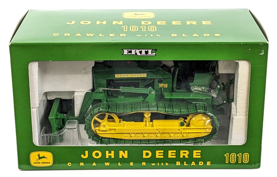 1/16 Ertl John Deere 1010 Crawler with Blade Plow City Farm Show: 1/16 Ertl John Deere 1010 Crawler w/ Blade. Plow City Farm Toy Show edition. Good condition new in the box and highly detailed.