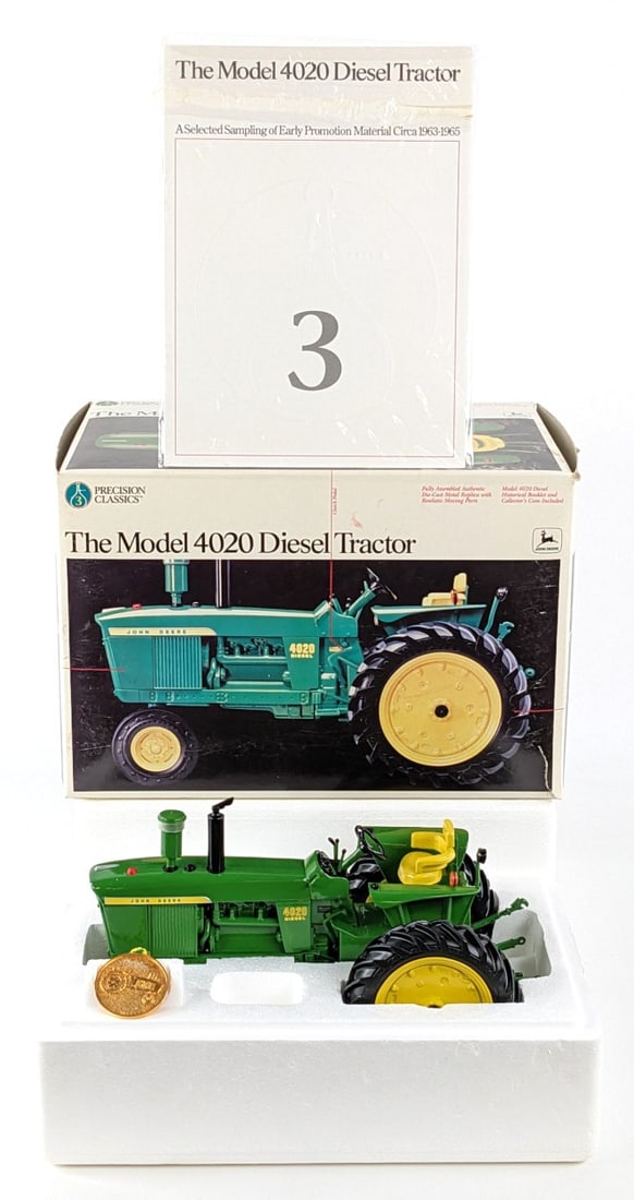 1/16 Ertl John Deere 4020 Diesel Tractor Precision Classics #3: 1/16 Scale Ertl John Deere 4020 Diesel narrow front tractor. Precision Classics Series #3. Good condition in the box and highly detailed. Comes with the historical booklet and collector's coin.