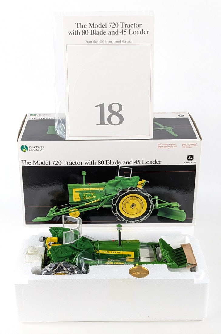 1/16 Ertl John Deere Model 720 Tractor w/ 80 Blade & 45 Loader Precision Classics #18: 1/16 Ertl John Deere Model 720 Tractor with 80 Blade and 45 Loader. Precision Classics Series #18. Good condition new in the box and highly detailed. Comes with the historical booklet and collector's