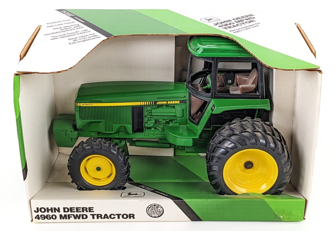 1/16 Ertl John Deere 4960 Tractor w/ MFWD: 1/16 Ertl John Deere 4960 tractor with MFWD. Good condition new in the box. A very nice looking box and getting somewhat hard to find.
