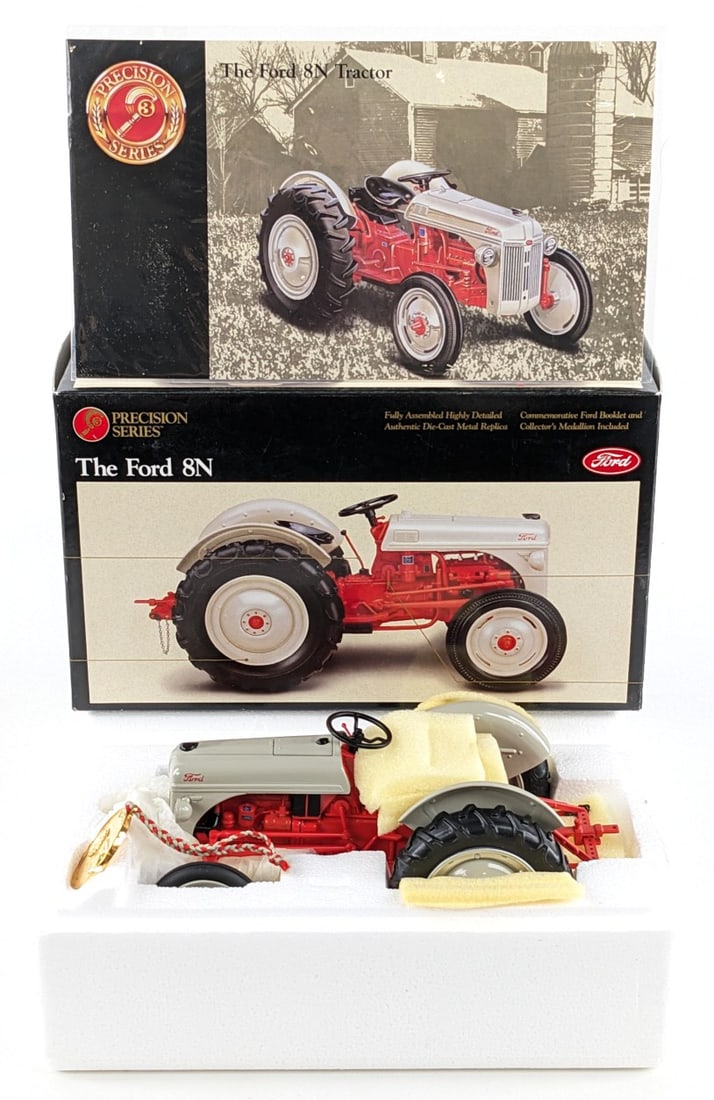 1/16 Ertl Ford 8N Tractor Precision Classics Series #3: 1/16 Ertl Ford 8N tractor. Precision Classics Series #3. Good condition new in the box. Comes with the booklet and medallion.