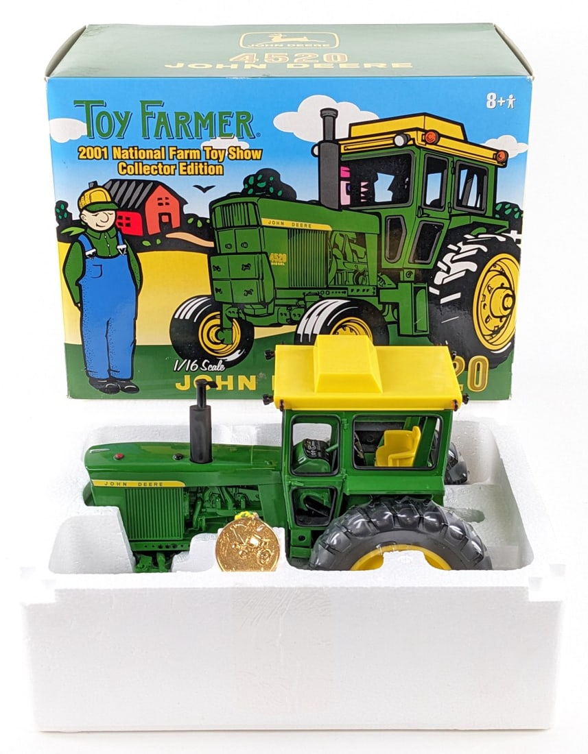 1/16 Ertl John Deere 4520 Tractor w/ Cab 2001 Toy Farmer: 1/16 Ertl John Deere 4520 diesel tractor with cab. Toy Farmer 2001 National Farm Toy Show Collector's Edition. The tractor comes with the certificate of authenticity and medallion. Good condition new