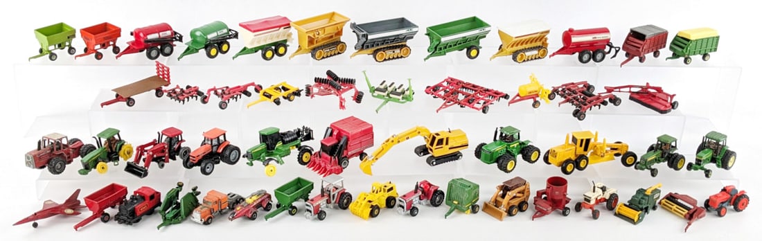 Large Lot of 1/64 Scale Farm Toys: Large lot of 1/16 scale farm toys and vehicles. Includes John Deere backhoe, Wagons, Case IH cotton picker, 4wd's, implements, and more. All showing wear from play and storage. Some showing damage / m