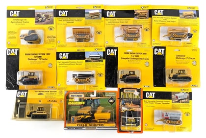 (12) 1/64 Ertl & Matchbox Caterpillar Toys In Packaging