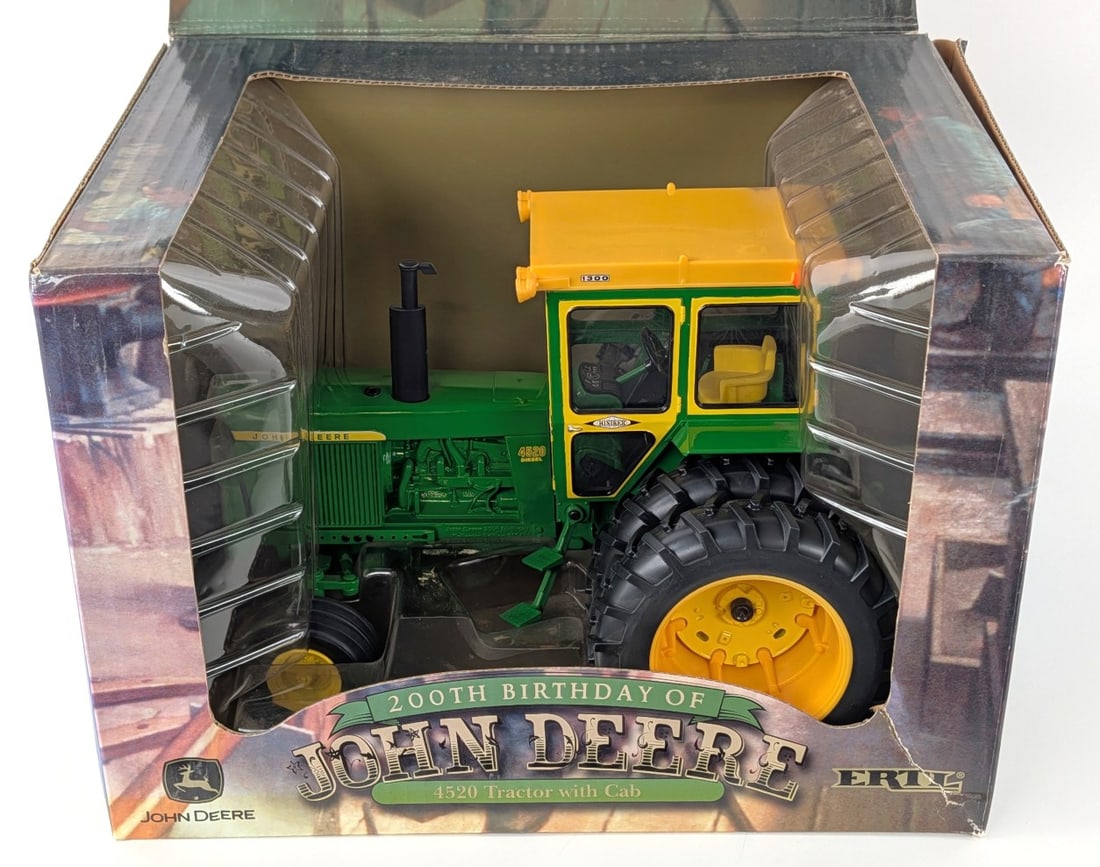 1/16 Ertl John Deere 4520 Tractor with Cab & Duals: 1/16 Ertl John Deere 4520 tractor with cab and duals. 200th Birthday of John Deere edition. Good condition in the box with light dust from storage / display.