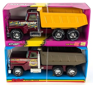 (2) Nylint Dump Trucks