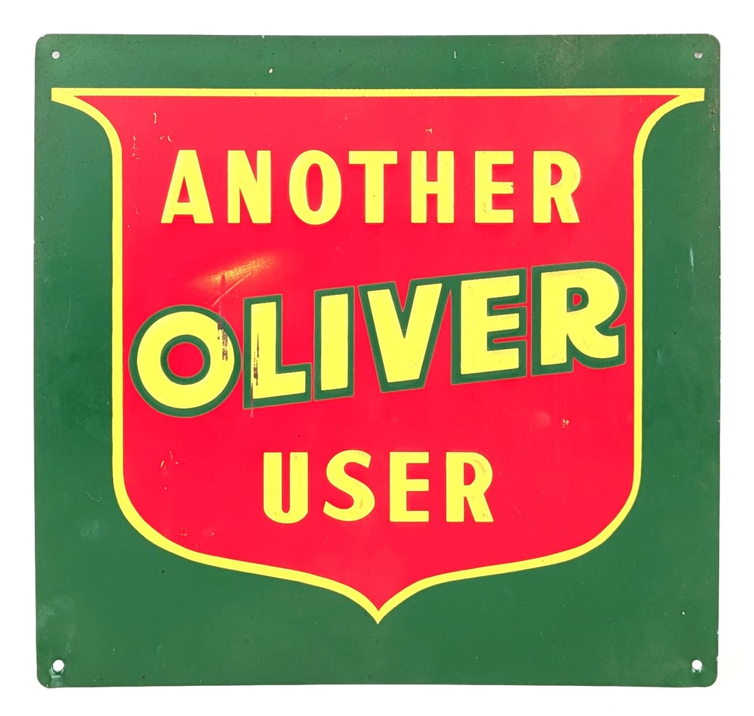 SST "Another Oliver User" Embossed Oliver Tractors Advertising Sign: Single sided tin Oliver tractors "Another Oliver User" embossed advertising sign. The sign has light wear from storage and display. Measures approximately 12" across by 11-1/2" tall.