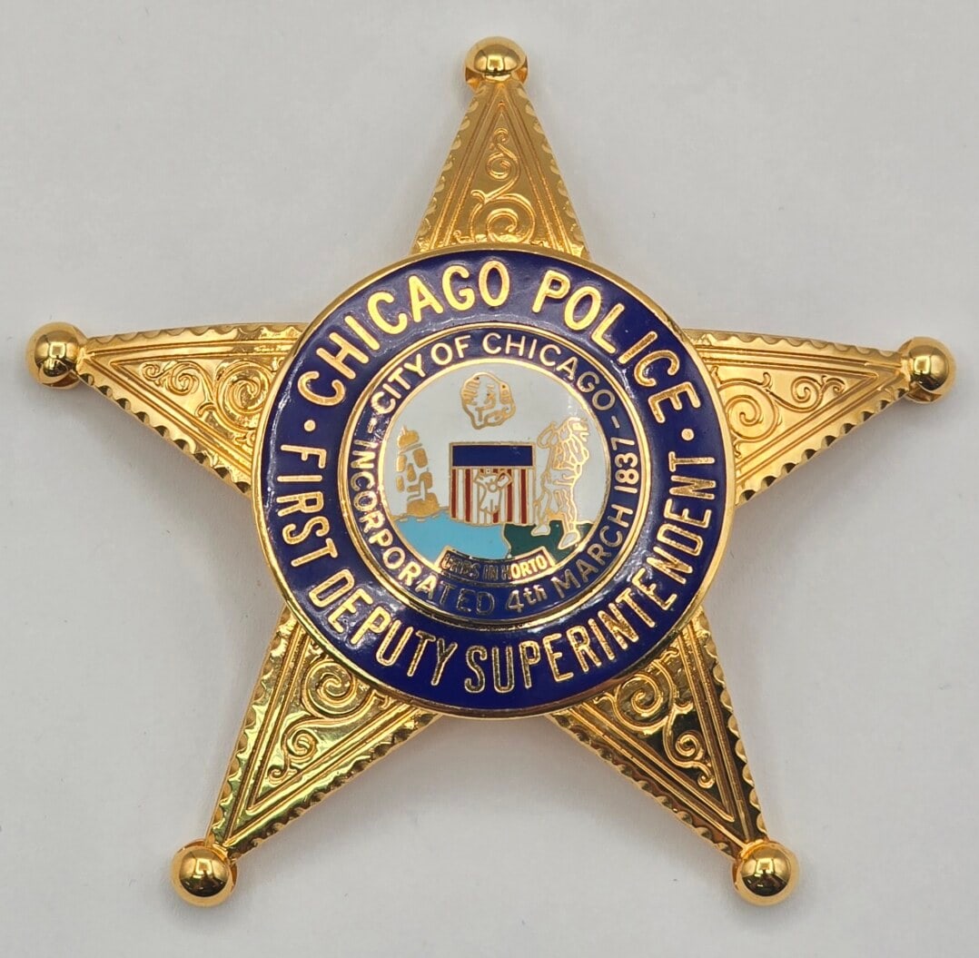 Obsolete Blackinton Chicago Police First Deputy Superintendent Star Badge: Obsolete gold-tone Chicago Police First Deputy Superintendent 5-Point Star Badge with ball tips. Badge is in nice condition with a pin back, has some very light age and use wear. Maker marked Blackint