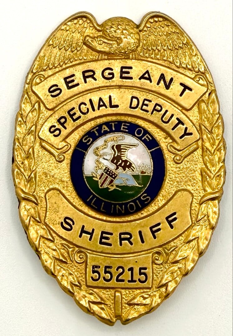 Obsolete State Of Illinois Special Deputy Sheriff Sergeant Wallet Shield Badge #55215: Obsolete State Of Illinois Special Deputy Sheriff Sergeant Wallet Shield Badge. The badge has a flat back with two tacks and some age and use wear. No maker mark. Badge measures approximately 3" tall 