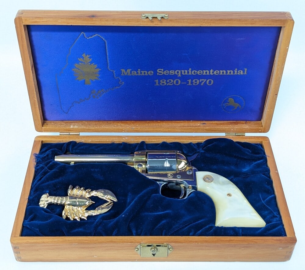1970 Colt Maine Sesquicentennial Frontier Scout .22 LR Single Action Revolver w/ Case: Manufacturer: Colt, Model: Frontier Scout, Type: Revolver, Caliber/Gauge: .22 LR, Barrel: 4-3/4 inch, Choke: , Finish: Gold & Nickel, Grip: Faux Pearl, Stock: , Condition: Nice with some tarnishing on