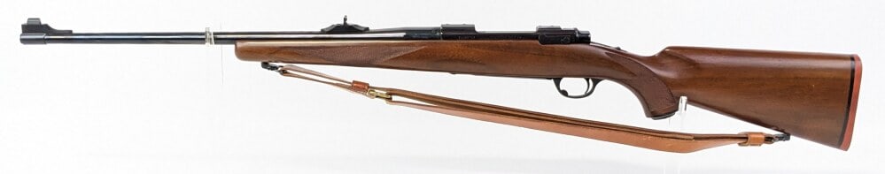 Ruger M77 .30-06 Sprg Bolt Action Rifle: Manufacturer: Ruger, Model: M77, Type: Rifle, Caliber/Gauge: .30-06 Sprg, Barrel: 22 inch, Choke: , Finish: Blued, Grip: , Stock: Checkered Wood, Condition: Very nice with light wear from use and hand
