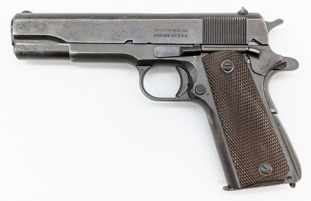 WWII Remington Rand M1911A1 US Army .45 ACP Semi Auto Pistol: Manufacturer: Remington Rand, Model: M1911A1, Type: Pistol, Caliber/Gauge: .45 ACP, Barrel: 5 inch, Choke: , Finish: Parkerized, Grip: Plastic, Stock: , Condition: Nice with some scuffs, wear, and fin