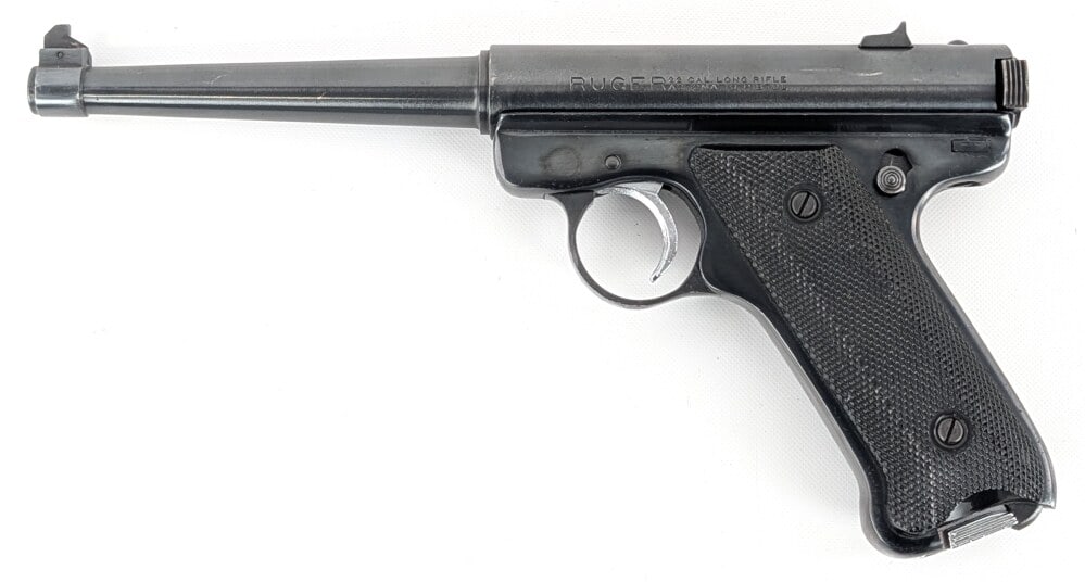 Ruger Mark I .22 LR Semi Auto Pistol: Manufacturer: Ruger, Model: Mark I, Type: Pistol, Caliber/Gauge: .22 LR, Barrel: 6 inch, Choke: , Finish: Blued, Grip: Checkered Plastic, Stock: , Condition: Nice with light scuffs and wear from use a