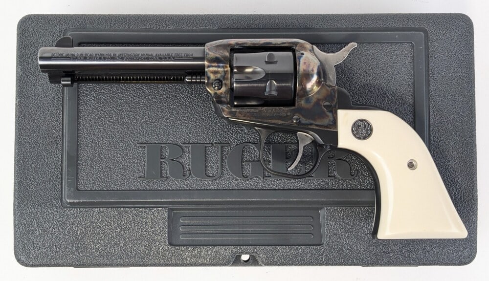Ruger New Model Single Six .32 H&R Mag Revolver w/ Case: Manufacturer: Ruger, Model: New Model Single-Six, Type: Revolver, Caliber/Gauge: .32 H&R Mag, Barrel: 4-5/8 inch, Choke: , Finish: Blued & Color Case Hardened, Grip: White Plastic, Stock: , Condition: