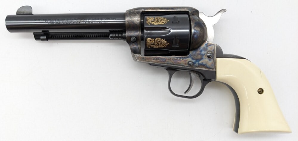 Ruger Vaquero Factory Engraved .45 LC Single Action Revolver: Manufacturer: Ruger, Model: Vaquero, Type: Revolver, Caliber/Gauge: .45 LC, Barrel: 5-1/2 inch, Choke: , Finish: Blued & Color Case Hardened, Grip: White Plastic, Stock: , Condition: Very nice with a