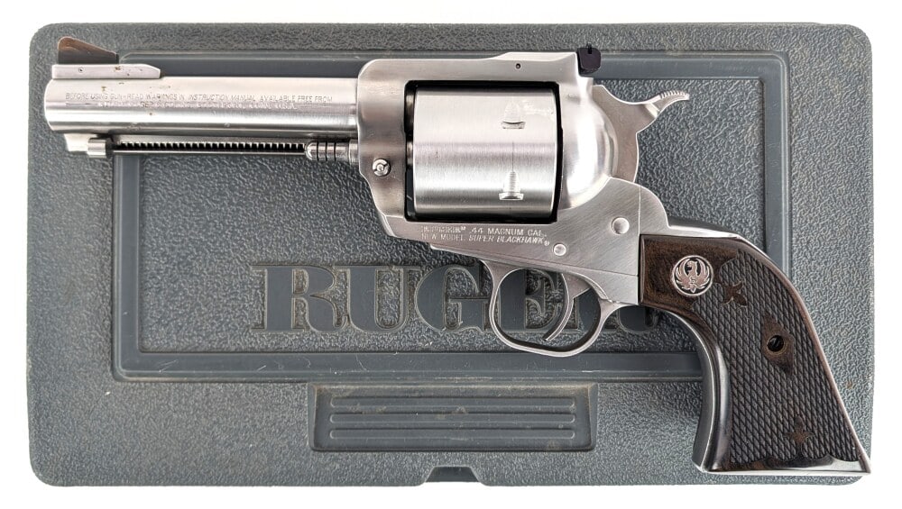 Ruger New Model Super Blackhawk .44 Magnum Revolver: Manufacturer: Ruger, Model: New Model Super Blackhawk, Type: Revolver, Caliber/Gauge: .44 Mag, Barrel: 4-5/8 inch, Choke: , Finish: Stainless Steel, Grip: Checkered Wood, Stock: , Condition: Nice with