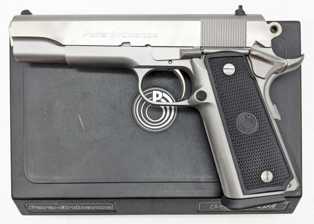 Para-Ordnance Model 14.45 LDA .45 ACP Semi Auto Pistol: Manufacturer: Para-Ordnance , Model: 14.45 LDA, Type: Pistol, Caliber/Gauge: .45 ACP, Barrel: 5 inch, Choke: , Finish: Stainless Steel, Grip: Checkered Plastic, Stock: , Condition: Very nice with ligh