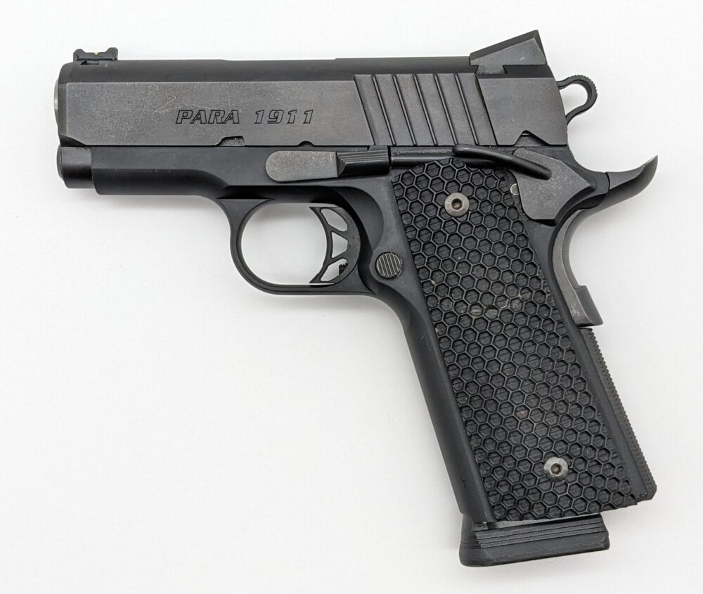 Para 1911 Expert Carry .45 ACP Semi Auto Pistol: Manufacturer: Para USA, Model: 1911 Expert Carry, Type: Pistol, Caliber/Gauge: .45 ACP, Barrel: 3 inch, Choke: , Finish: Black, Grip: Hexagon Checker Black Plastic, Stock: , Condition: Nice with light