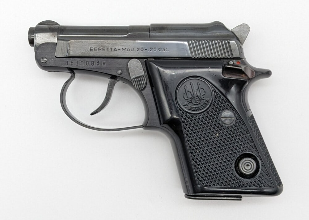 Beretta Model 20 .25 ACP Semi Auto Pistol: Manufacturer: Beretta, Model: 20, Type: Pistol, Caliber/Gauge: .25 ACP, Barrel: 2-3/8 inch, Choke: , Finish: Blued, Grip: Checkered Plastic, Stock: , Condition: Very nice with light wear from use and