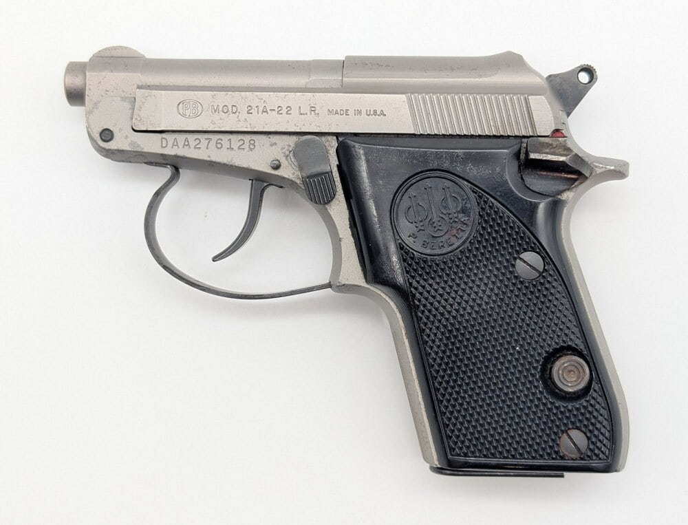 Beretta Model 21A .22 LR Semi Auto Pistol: Manufacturer: Beretta, Model: 21A, Type: Pistol, Caliber/Gauge: .22 LR, Barrel: 2-3/8 inch, Choke: , Finish: Stainless Steel, Grip: Checkered Plastic, Stock: , Condition: Used with spots of finish wea