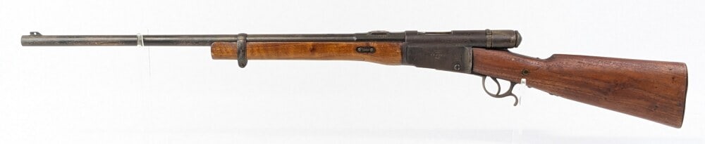 Swiss Vetterli M81 .41 Swiss Bolt Action Rifle: Manufacturer: Waffenfabrik, Model: M81, Type: Rifle, Caliber/Gauge: .41 Swiss, Barrel: 25-1/2 inch, Choke: , Finish: Blued, Grip: , Stock: Wood, Condition: Worn custom condition with a cut down stock,