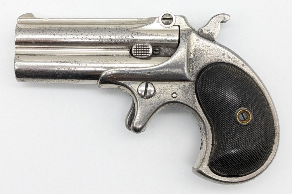 Remington Arms Third Model 95 .41 RF Double Derringer: Manufacturer: Remington Arms, Model: 95, Type: Derringer, Caliber/Gauge: .41 Short, Barrel: 3 inch, Choke: , Finish: Nickel, Grip: Checkered Plastic, Stock: , Condition: Aged with heavy finish wear, p