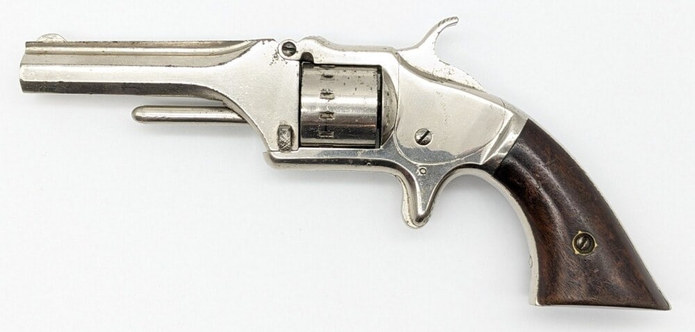 American Standard Tool Co. .22 Cal Pocket Spur Trigger Revolver: Manufacturer: American Standard Tool Co., Model: Pocket, Type: Revolver, Caliber/Gauge: .22 Cal, Barrel: 3-1/8 inch Octagon, Choke: , Finish: Nickel, Grip: Smooth Wood, Stock: , Condition: Fair with s