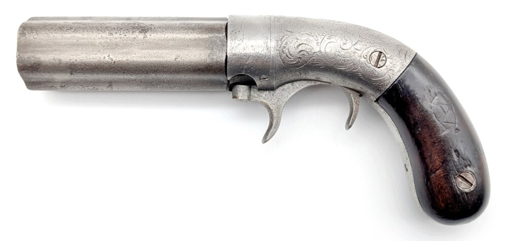 Unmarked .28 Cal 6-Shot Pepperbox Pistol: Manufacturer: Unknown , Model: Pepperbox, Type: Black Powder, Caliber/Gauge: .28 Cal, Barrel: 3-3/8 inch, Choke: , Finish: Nickel & Gray, Grip: Smooth Wood, Stock: , Condition: Good aged condition wit