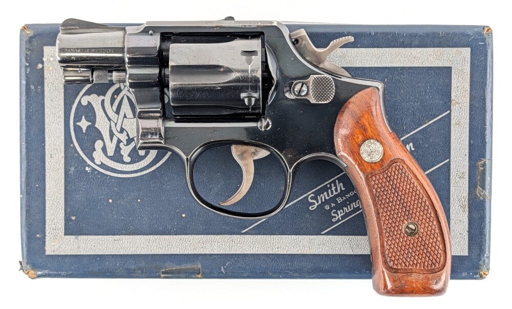 Smith & Wesson Model 10-5 Military & Police .38 Spl Revolver w/ Box: Manufacturer: Smith & Wesson, Model: 10-5 Military & Police, Type: Revolver, Caliber/Gauge: .38 Spl, Barrel: 2 inch, Choke: , Finish: Blued, Grip: Checkered Wood, Stock: , Condition: Used with finish