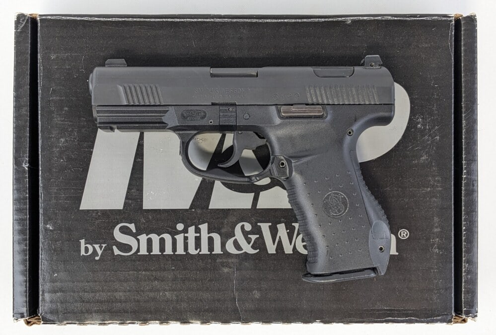 Smith & Wesson SW99 .40 S&W Semi Auto Pistol w/ Box: Manufacturer: Smith & Wesson, Model: SW99, Type: Pistol, Caliber/Gauge: .40 S&W, Barrel: 4-1/8 inch, Choke: , Finish: Black, Grip: Polymer, Stock: , Condition: Very nice with light wear from use and h