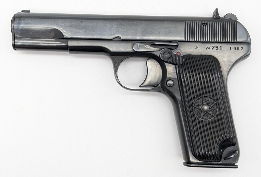 Romanian TTC 7.62 x 25mm Semi Auto Pistol: Manufacturer: Romania, Model: TTC, Type: Pistol, Caliber/Gauge: 7.62 x 25mm, Barrel: 4-1/2 inch, Choke: , Finish: Blued, Grip: Striped Plastic, Stock: , Condition: Good with scuffs and finish wear fro