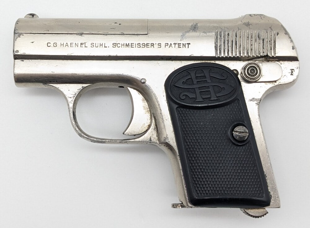 C.G. Haenel Schmeisser Model 1 .25 ACP Semi Auto Pistol: Manufacturer: C.G. Haenel Schmeisser, Model: 1, Type: Pistol, Caliber/Gauge: .25 ACP, Barrel: 2-1/8 inch, Choke: , Finish: Nickel, Grip: Checkered Plastic, Stock: , Condition: Fair aged condition with