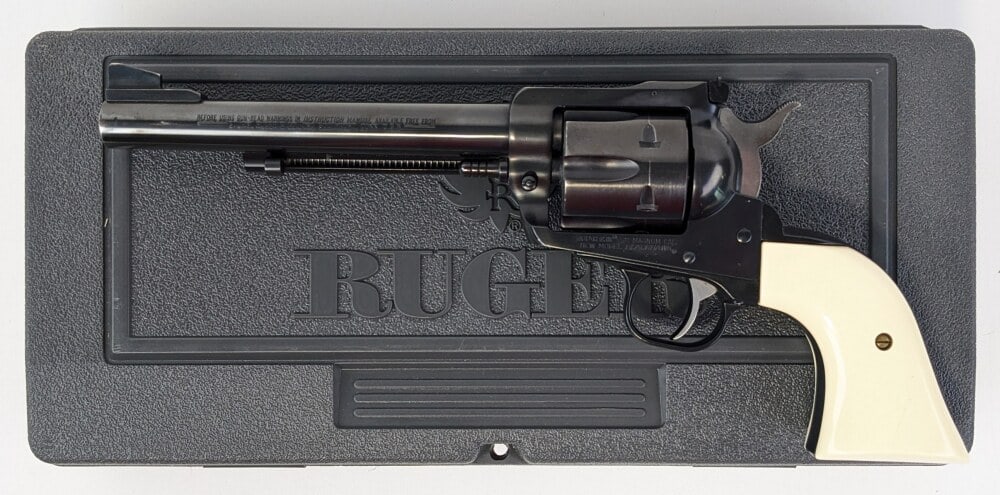 Ruger New Model Blackhawk .41 Magnum Revolver w/ Case: Manufacturer: Ruger, Model: New Model Blackhawk, Type: , Caliber/Gauge: .41 Mag, Barrel: 6-1/2 inch, Choke: , Finish: Blued, Grip: White Plastic, Stock: , Condition: Nice with light scuffs and wear fr