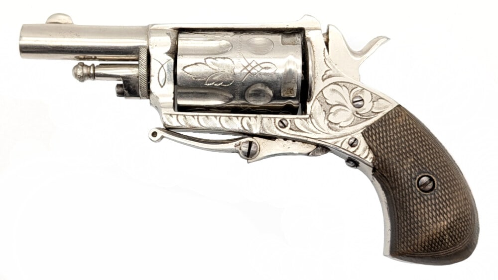 Antique British Bulldog .22 Cal 5-Shot Revolver: Manufacturer: Britain , Model: Bulldog, Type: Revolver, Caliber/Gauge: .22 Cal, Barrel: 1-3/4 inch, Choke: , Finish: Nickel, Grip: Checkered Wood, Stock: , Condition: Nice with some tarnishing and scu