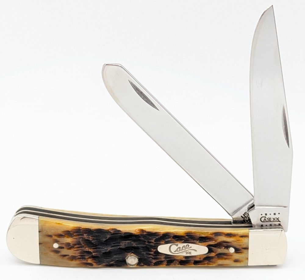 2000 Case XX Employees and Associates Set Amber Bone Trapper 1 of 350 6254: 2000 Case XX Employee Associates Knife set Amber Bone Trapper.? This is 1 of 350 and the differentiating factor on these knives is they have pins and liners that are nickel silver instead of brass.? K