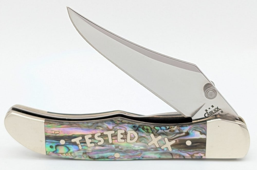 2003 Case XX Tested XX Abalone Mid Folding Hunter 81265LC: Knife is in very nice condition with light scuffs from handling. Overall measures 4in when closed.