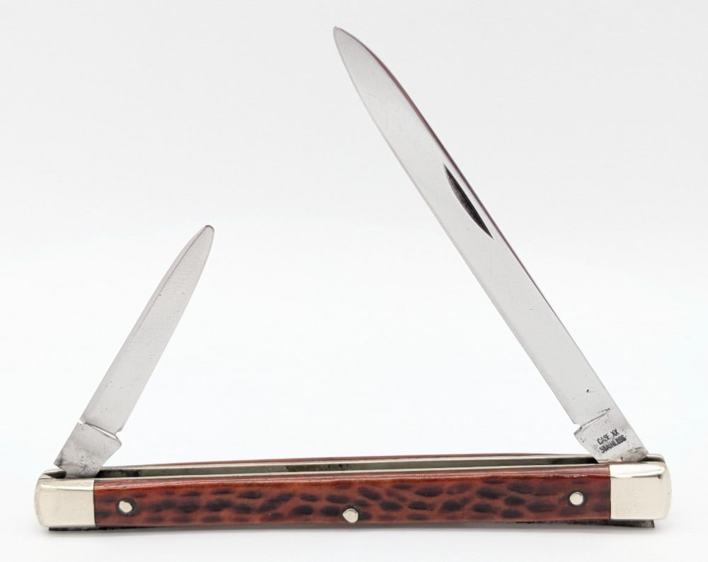 1940-64 Case XX Red Bone Citrus Tester Knife 6296X: Knife is in nice cleaned condition with some material loss and scratches on the blades, some scuffs and dings on the bolsters, and a pin crack through the center of the back handle scale. Overall meas