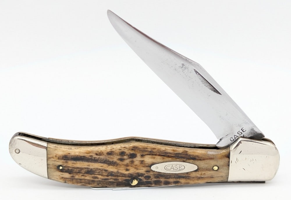 1940-64 Case XX Green Bone Folding Hunter Knife 6165: Knife is in aged cleaned condition with heavy material loss and scratches on the polished blade, scratches and dings on the polished bolsters, and a large pin crack on the back handle scale. Overall m
