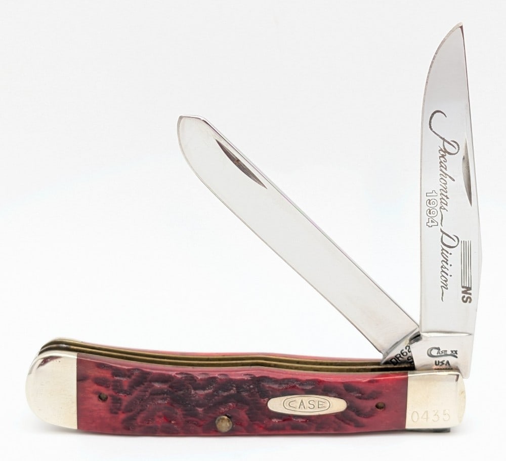 Ltd 1994 Case XX NS Pocahontas Division Red Bone Trapper 6254: Knife is numbered 0435, and is in very nice condition with light scuffs from handling. Overall measures 4-1/8in when closed.