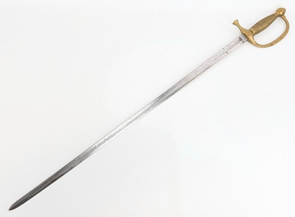 Civil War 1864 U.S. Emerson & Silver DPH Model 1840 Officers Sword: Features a fullered blade, a brass D guard, and a wrapped wire handle. Sword is in good aged condition with a good bit of pitting on the blade, and light scuffs and tarnishing on the guard and handle