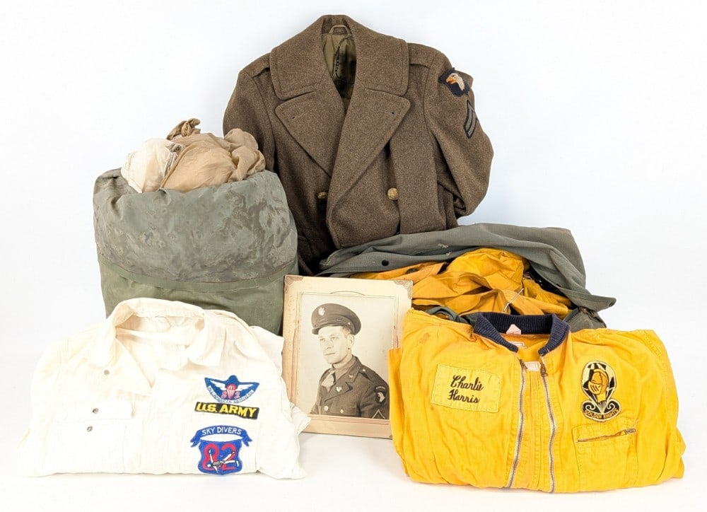 Named Vietnam War Master Sergeant Coveralls, Parachute, Over Coat, & more: Lot is named to Charles J. Harris from Dolton, IL of the Golden Knights US Army Parachute Team D-621 stationed at Ft. Bragg. Lot includes two sets of coveralls, his parachute pack, his parachute, life