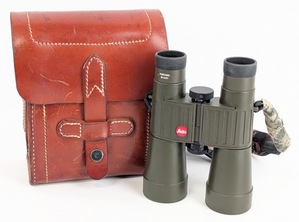 Leitz Leica Trinovid 7x42 BA 140m/1000m Binoculars w/ Custom Leather Case: Binoculars are in very nice condition with a great clear sight picture, and minimal scuffs from use. The custom leather case is made from quality leather and soft fleece lined. Red #: 7516