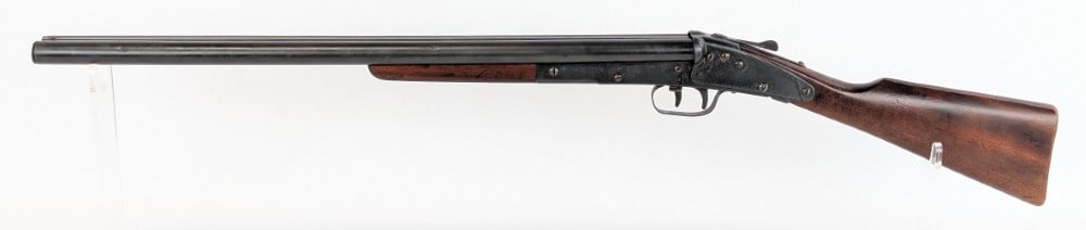 Daisy Model No. 104 Double Barrel Shotgun Air Rifle: Rifle is in nice refurbished condition with a quality done rebluing on the barrels and receiver, and what appears to be an original stock and forearm. Rifle does have a fair bit of pitting on the unde