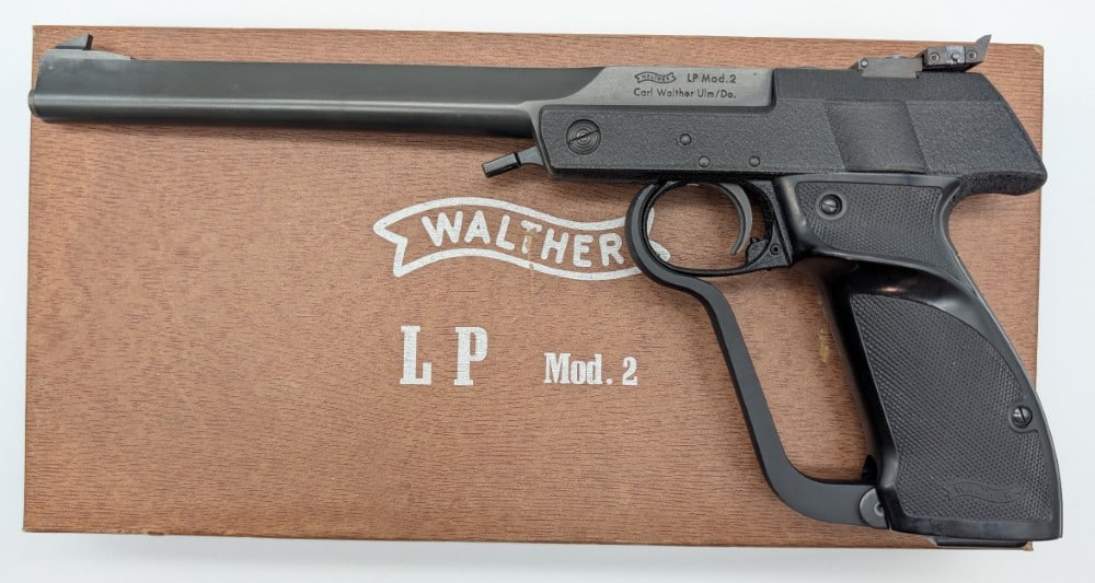 Walther LP Model 2 .177 Cal BB Target Air Pistol w/ Box: Pistol is in very nice condition with light scuffs from use and handling, and some strange white build up around the front sight. Barrel length measures 9-1/2in. SN: 22721 Ref #: 1024