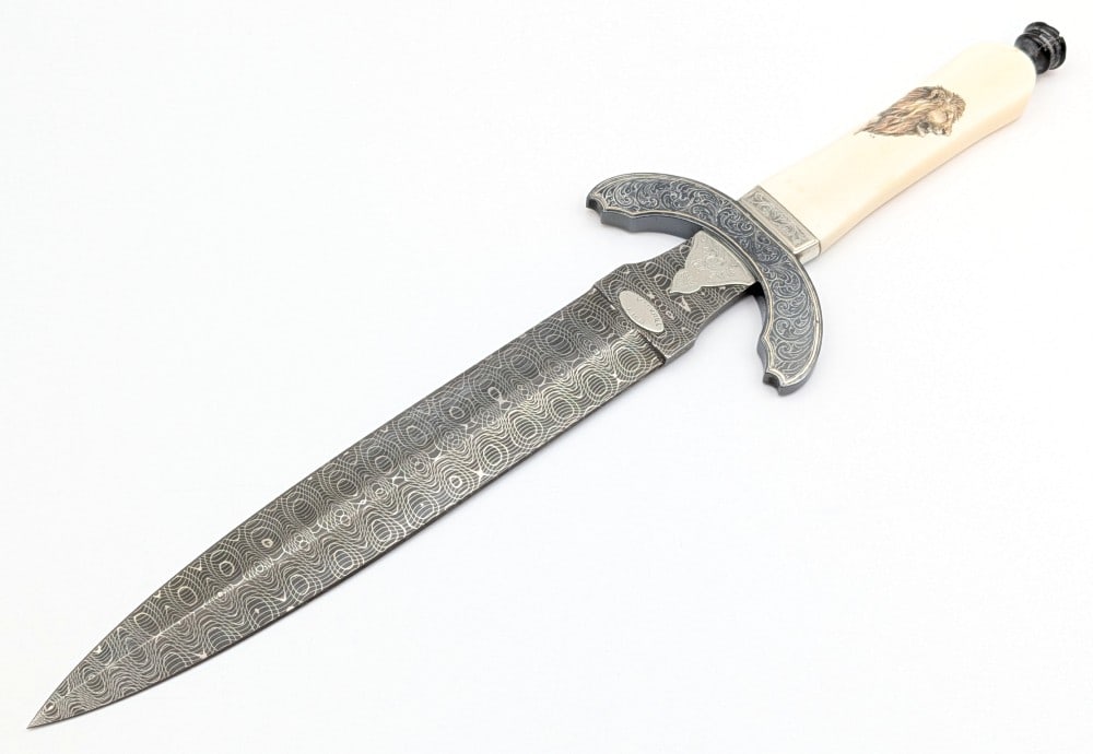 Stephen Mackrill Swirl Damascus Exotic Bone Double Edged Dagger: Features a gorgeous swirl damascus double edged blade, an upswept blued double guard with scroll engraving and I believe silver inlay border, a nickel silver collar with scroll engraving and a silver