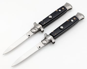 (2) Vtg Synth Black Swing Guard Switchblade Knives